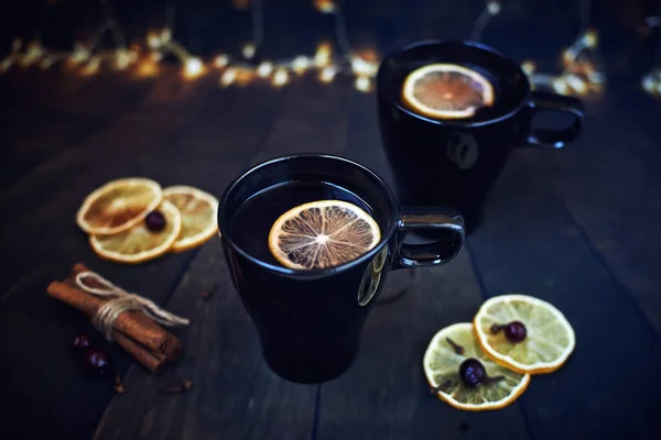 Two Black Cups Tea Lemon Dark Background Lemon Slices Cinnamon — Stock Photo, Image