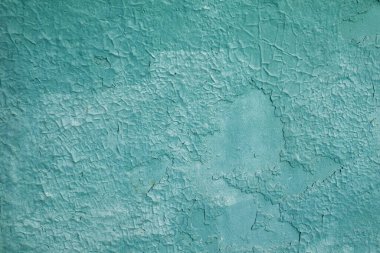 Eski yeşil bir duvarın dokusu. kabaca arkaplan.