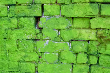 Eski yeşil tuğla bir duvarın dokusu. Yakın çekim, desen.