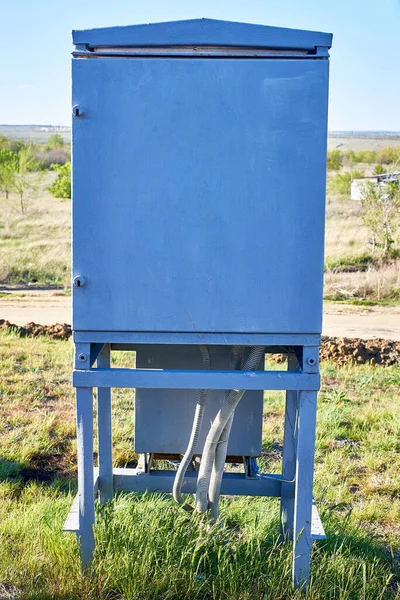 Voltage rectifier box. Electrical device. A typical protective device in a closed case. Selective focus, close-up