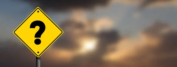 Question Mark road sign in panoramic Cloudy sky blur background. Business question concept idea