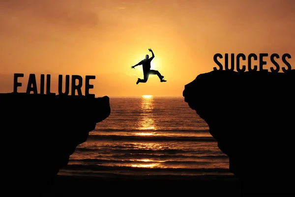 Failure Success Concept Silhouette Person Jumping Cliff Sunset Beach — Stock Photo, Image