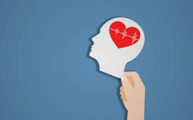 El ele tutuşan insan kafası şekli ve kalp şeklindeki beyin. Dünya Akıl Sağlığı Günü, Dünya Sağlık Günü ve Sağlık Konsepti. Mavi Arkaplan