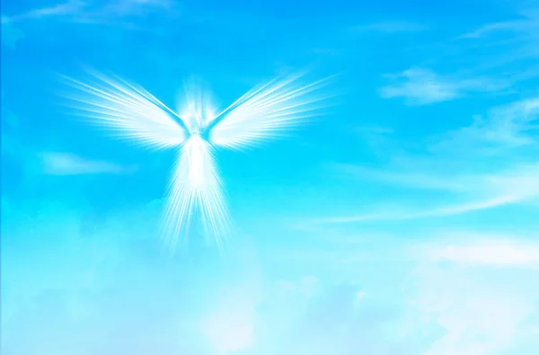 White Angel of Light in Blue Sky. Spiritual guidance concept. Angelic wings in turquoise heaven sky. Spirit