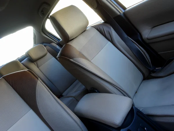 Vehicle safety. Headrests and safety belts inside car interior — Stock Photo, Image