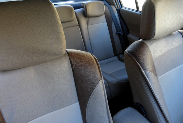 Car interior with bright leather upholstery on the car seats stock image 