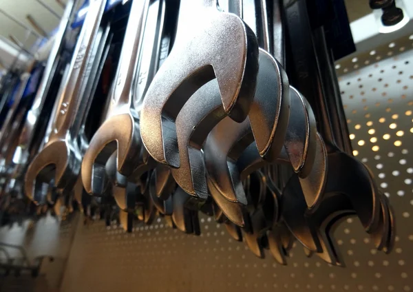 Bottom view of open ended wrenches on the showcase of hardware shop — Stock Photo, Image