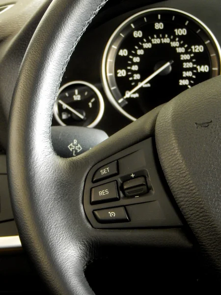 Car interior. Dashboard and controls on steering wheel — Stock Photo, Image