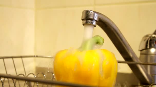 Juicy vegetables washing in kitchen sink — Stock Video