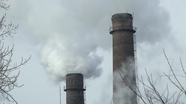 Smokestacks polluting air at industrial area — Stock Video