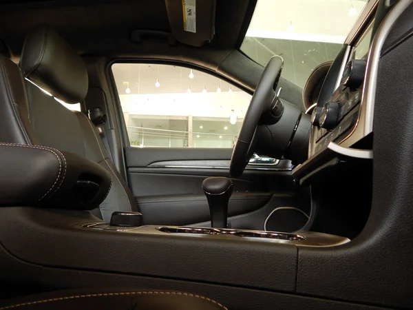 Leather upholstery and bullettproof glass in car interior detailed — Stock Photo, Image