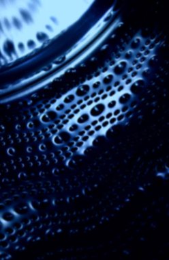 Devasa yuvarlak, aydınlatmalı sektör dikey fotoğrafının altındaki kabartmalı dairelerin gelecekteki koyu mavi deseni.