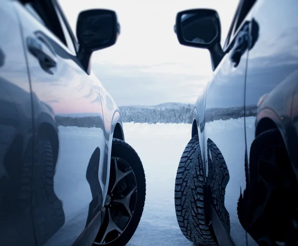 Studded winter tires against studless winter tires — Stock Image Studded winter tires against studless winter tires Stock Picture