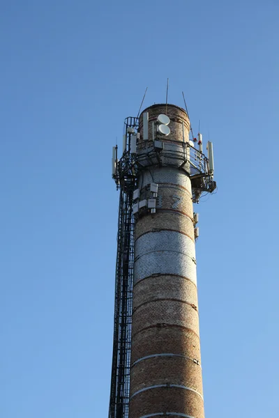 Radio location system on the top of old smokestack — Stock Photo, Image