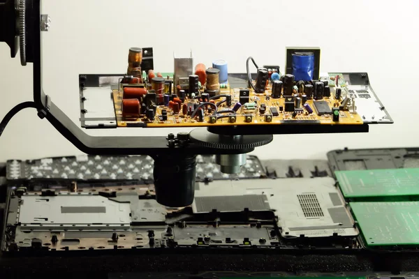 Electronic board with radio components at electronics plant conveyor