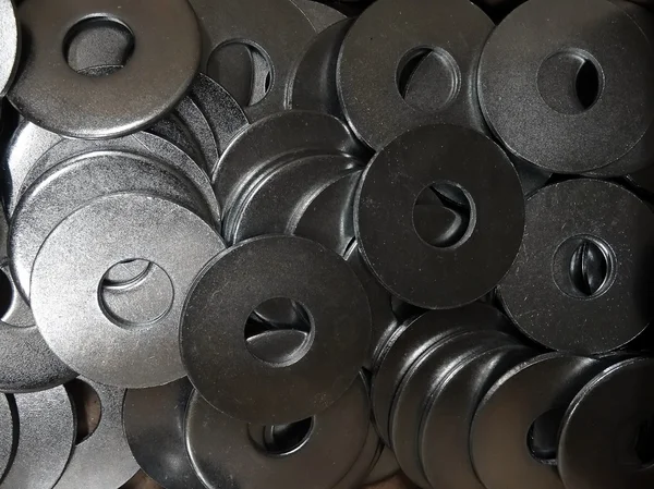 Produtos de metal. Lavadoras textura fundo — Fotografia de Stock