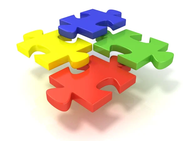 Vier kleurrijke puzzelstukken gezet apart. Geïsoleerd op een witte achtergrond — Stockfoto