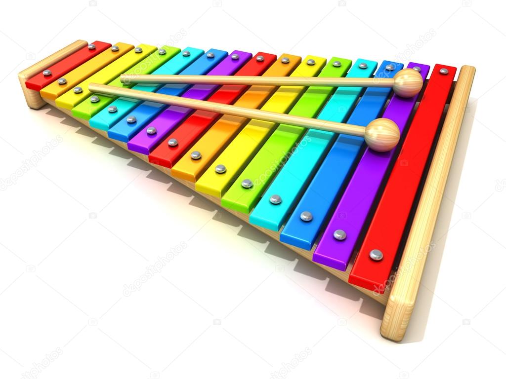 Xylophone with rainbow colored keys and with two wood drum sticks