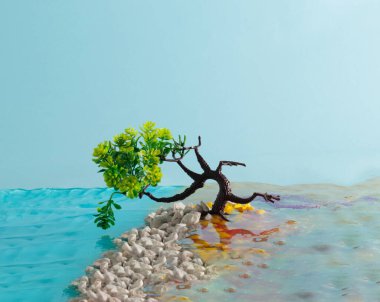 Doğanın iyi olabileceğini gösteren bir ağaç. Karşılaştırma okyanusu ağaca karşı. Soyut sanat. asgari yaratıcı fikir