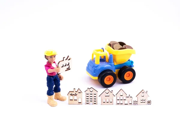 Wymień Monety Euro Tyłu Plastikowej Ciężarówki Zabawkami Kilka Emblematycznych Domków — Zdjęcie stockowe