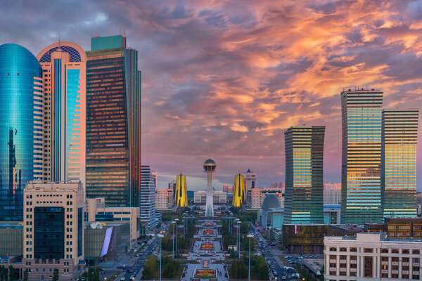 Bird's-eye view of the central part of the capital of Kazakhstan - the city of Astana with the residence of the president during a picturesque sunset