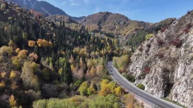 A picturesque mountain road near the Medeu skating rink near the Kazakh city of Almaty on an autumn day.