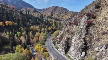 A picturesque mountain road near the Medeu skating rink near the Kazakh city of Almaty on an autumn day.