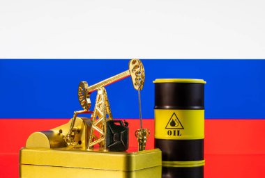Rusya Federasyonu bayrağının arka planında altın bir petrol pompası