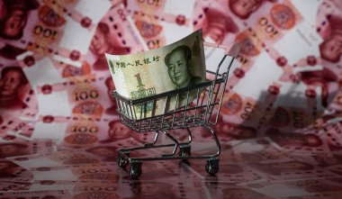 Minyatür bir süpermarket alışveriş arabasında 100 Yuan 'lık bir Çin banknotu.