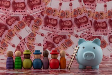 Sembolik ahşap insanlar ve arka planda 100 Çin Yuan 'ı olan bir kumbara..