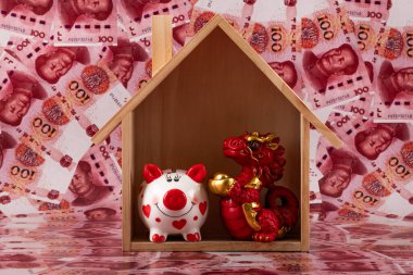 Sembolik bir Çin ejderhası ve bir köy evi 100 Çin yuanı banknotuna karşı..