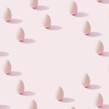 Yaratıcı monokromatik yumurta patern toz pembe ve fotokopi alanı ile. İzometrik ızgara.