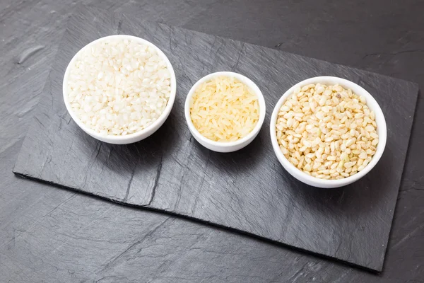 Three kinds of raw rice — Stock Photo, Image