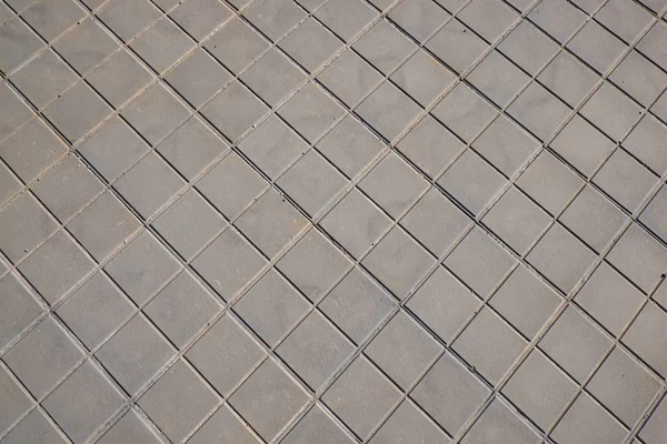 Sidewalk tile regular colors and geometric shapes — Stock Photo, Image