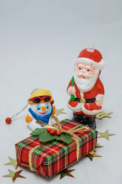 Weihnachtsmann und Schneemann — Stockfoto