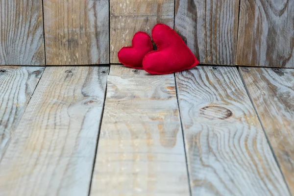 Two red hearts on a wooden background for Valentine's Day — Zdjęcie stockowe