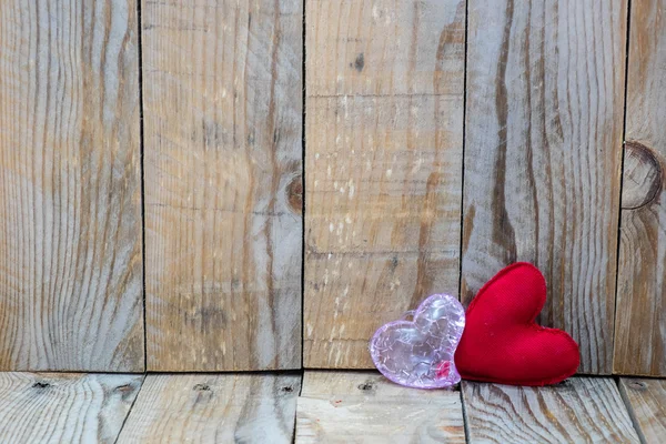 Two red hearts on a wooden background for Valentine's Day — Zdjęcie stockowe