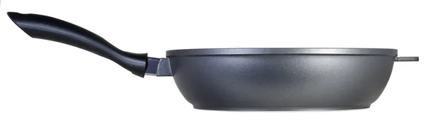 Черная тефлоновая сковорода — стоковое фото