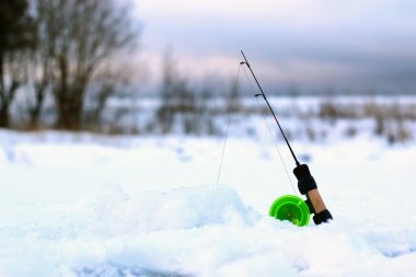 Little winter fishing rod ice clipart