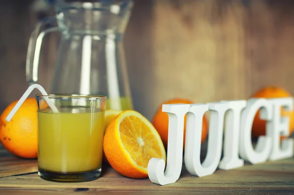 Toned orange juice glass slice — Stock Photo, Image