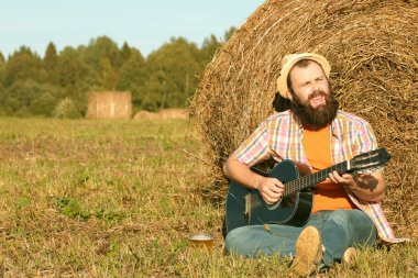 adam gitar ve bira niteliğine