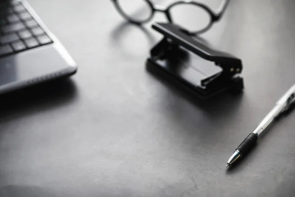 Working time symbolizes the desktop. Office desk with papers from insurance manager and banker. Office worker at the table. The concept of lack of time.