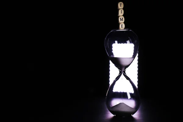 Sand Running Bulbs Hourglass Measuring Passing Time Countdown Deadline Dark — Stock Photo, Image
