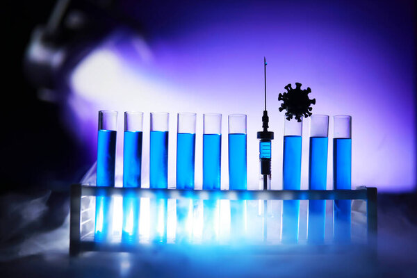 Test tube of glass overflows new liquid solution potassium blue conducts an analysis reaction takes various versions reagents using chemical pharmaceutics cancer manufacturing 