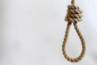 Skeine bağlanmış kalın bir ip. Dekorasyon ve tasarım için kenevir ipi. Balıkçılık ipinin arka planı.