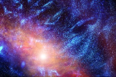 Evren 'in uzak bir galaksideki nebula ve yıldızlı astronomik fotoğrafı.