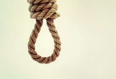 Skeine bağlanmış kalın bir ip. Dekorasyon ve tasarım için kenevir ipi. Balıkçılık ipinin arka planı.