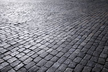 Gri kaldırım taşı, yaya geçidi, kaldırıma yakın kaldırım, dokusu, üst görünümü. Çimento tuğla kare taş zemin. Beton döşeme levhaları. Paving levhaları