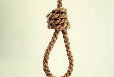 Skeine bağlanmış kalın bir ip. Dekorasyon ve tasarım için kenevir ipi. Balıkçılık ipinin arka planı.