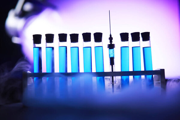 Test tube of glass overflows new liquid solution potassium blue conducts an analysis reaction takes various versions reagents using chemical pharmaceutics cancer manufacturing 